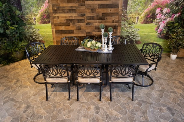 DWL Glenhaven Lynnwood Aluminum Patio Dining 46x93 Stone Harbor Table with 6 Stationary and 2 Swivel Dining Chairs