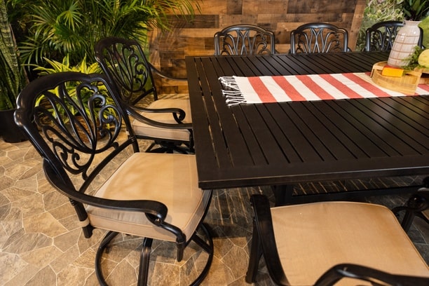 DWL Glenhaven Lynnwood Aluminum Patio Dining 60x93 Stone Harbor Slat Table with 6 Stationary and 4 Swivel Dining Chairs