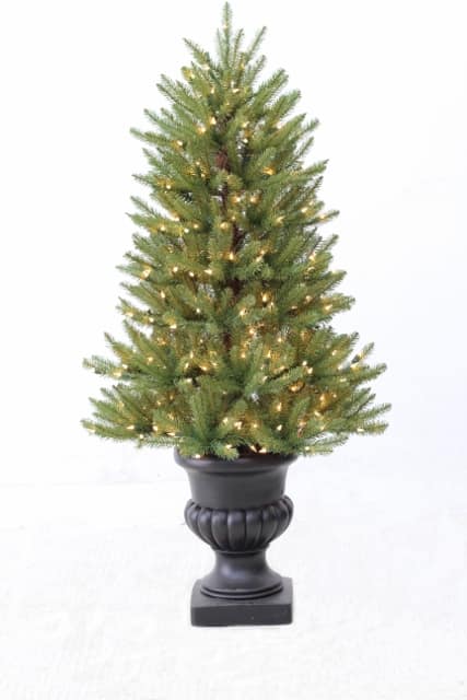 ozark fir artifical christmas tree prelit with clear lights in urn